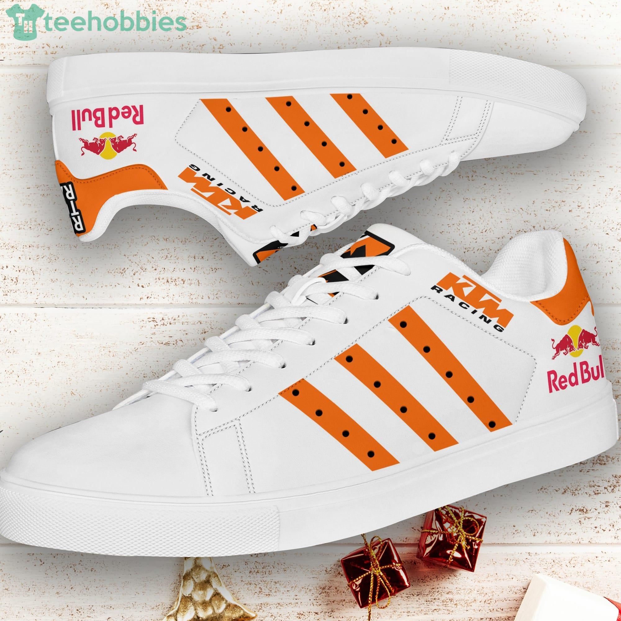 orange and white stan smith