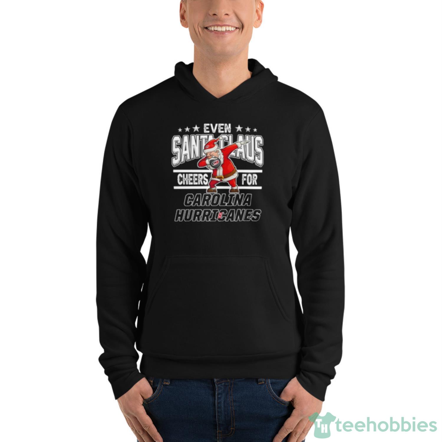Carolina Hurricanes Even Santa Claus Cheers For Christmas NHL Shirt For Fans - Unisex Fleece Pullover Hoodie Carolina Hurricanes Even Santa Claus Cheers For Christmas NHL Shirt For Fans - Unisex Fleece Pullover Hoodie