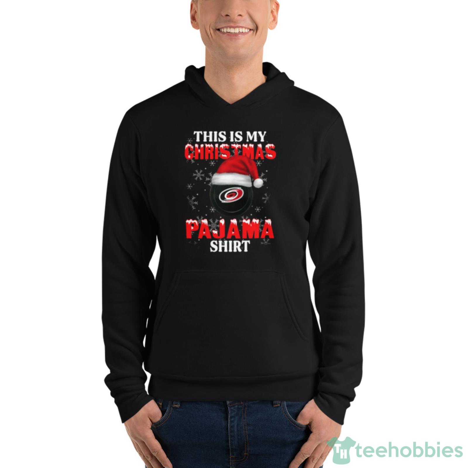 Carolina Hurricanes This Is My Christmas Pajama Shirt NHL Shirt For Fans image Carolina Hurricanes This Is My Christmas Pajama Shirt NHL Shirt For Fans - Unisex Fleece Pullover Hoodie