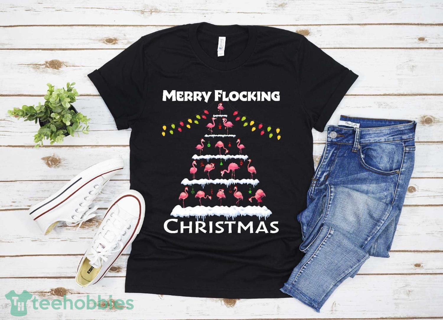 pink flamingo merry flocking christmas tree lights chain t-shirt Christmas Gift Family Christmas Shirt Product Photo 1