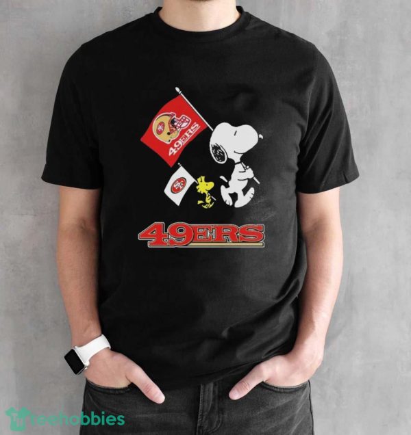 Official The Peanuts Snoopy And Woodstock San Francisco 49ers Football Flag Shirt - Black Unisex T-Shirt