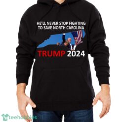 He Will Never Stop Fighting To Save North Carolina Trump 2024 T Shirt Trump 2024 - He Will Never Stop Fighting To Save North Carolina Trump 2024 Black Shirt Photo 2