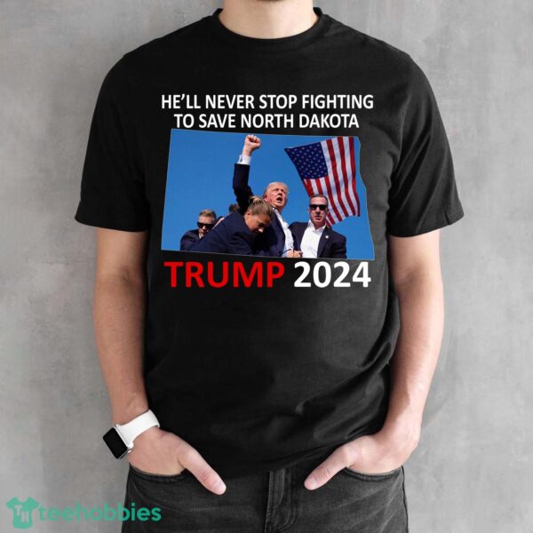 He Will Never Stop Fighting To Save North Dakota Trump 2024 Black Shirt - He Will Never Stop Fighting To Save North Dakota Trump 2024 Black Shirt Photo 1
