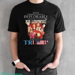 Official Never Underestimate A Deplorable Who Is A Fan Of The Big Lebowski And Loves Trump Signatures Shirt - Black Unisex T-Shirt