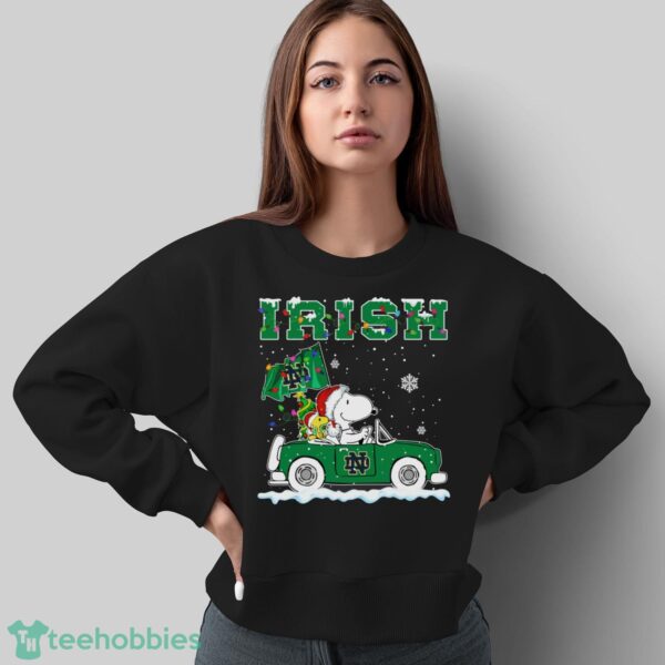 Notre Dame Fighting Irish Snoopy And Woodstock Driving Car Cute Snoopy Limited Edition Shirt - Sweatshirt